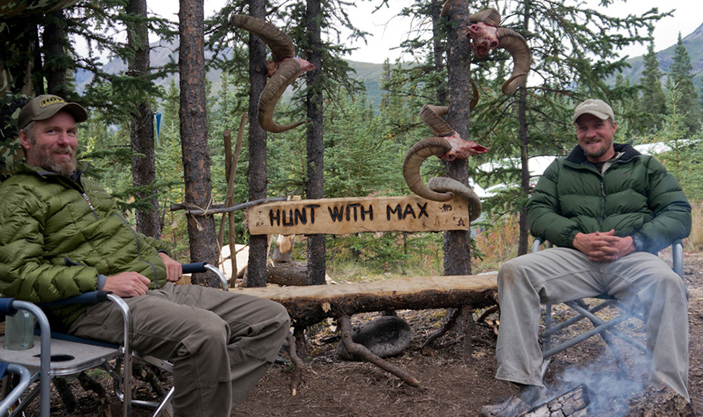 Hunters sitting in camp