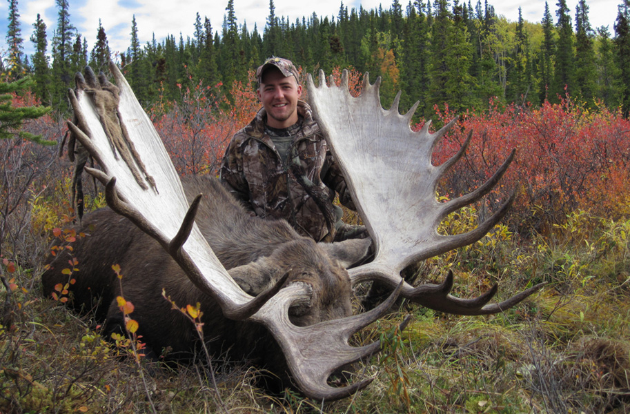 Tyler poses with antlers